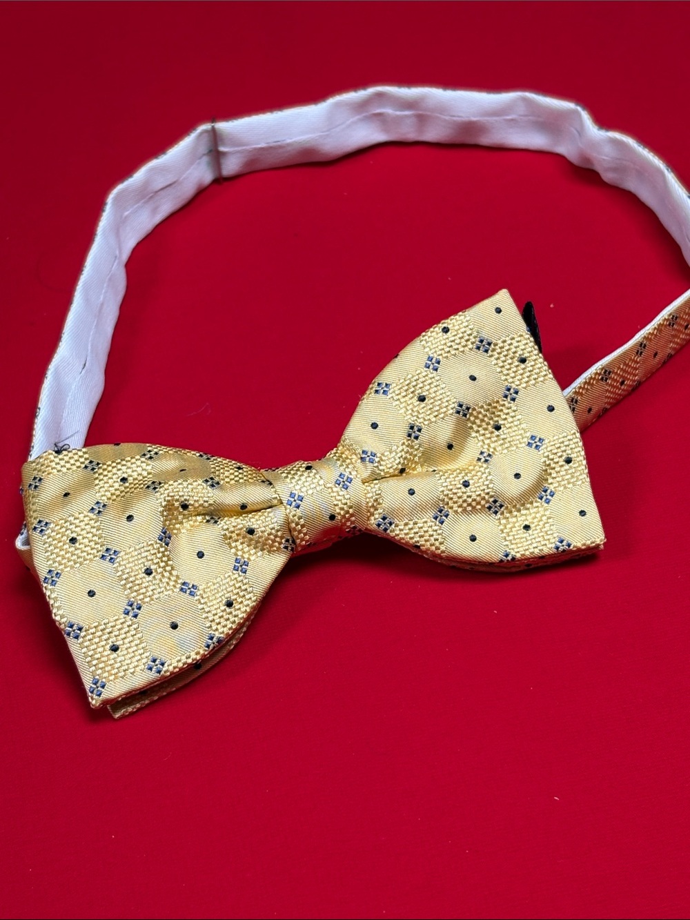 Tie Rack gold silk bow tie.
